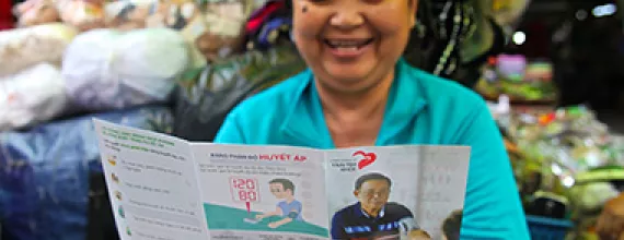 woman-reading-about-bloodpressure-image