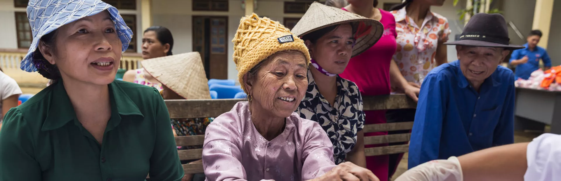 Patients getting screened in a community health camp in Vietnam