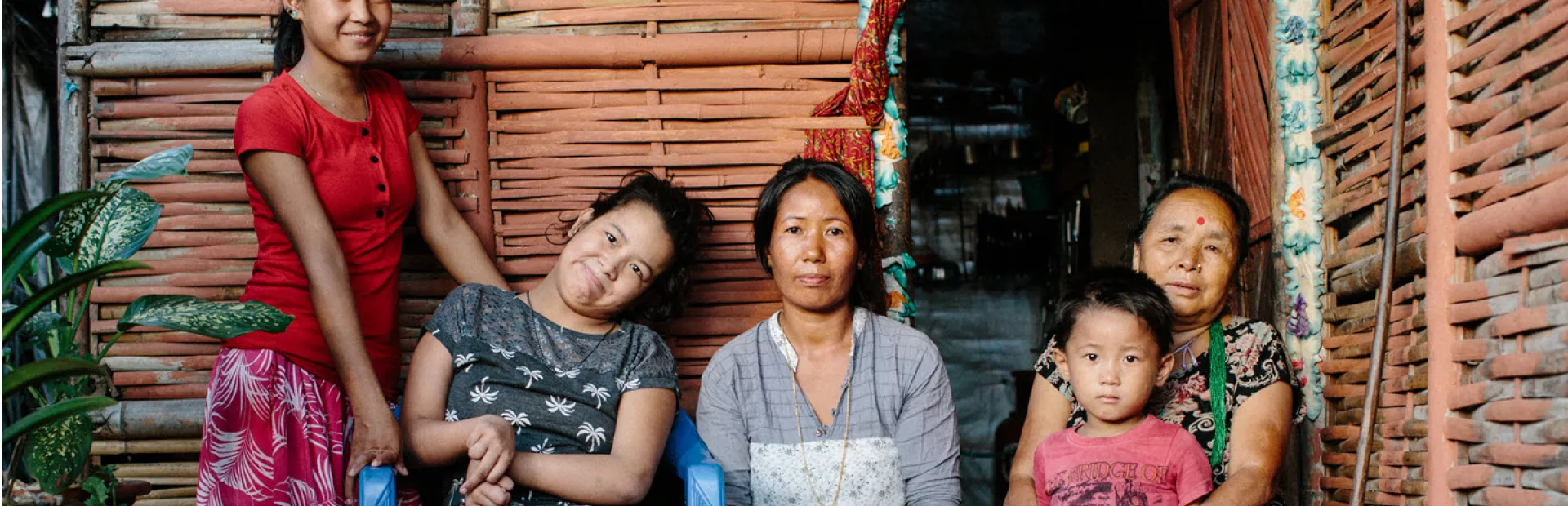 Family in front of their house participating in Leprosy Post-Exposure Prophylaxis (LPEP) Program in Nepal