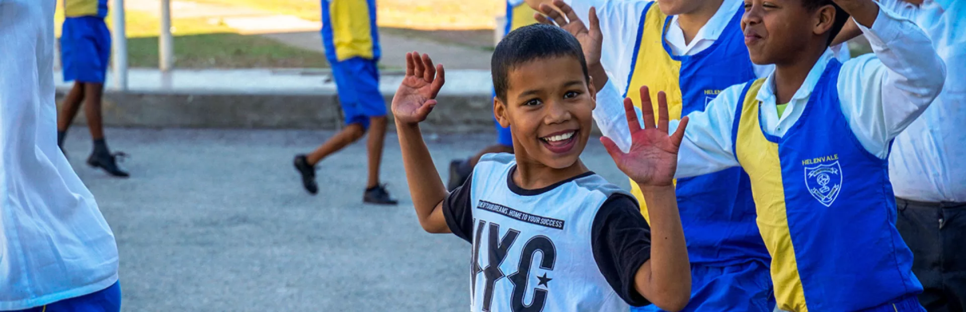 KaziBantu program: children in South Africa learning about cardio health and doing physical exercises outside of the school