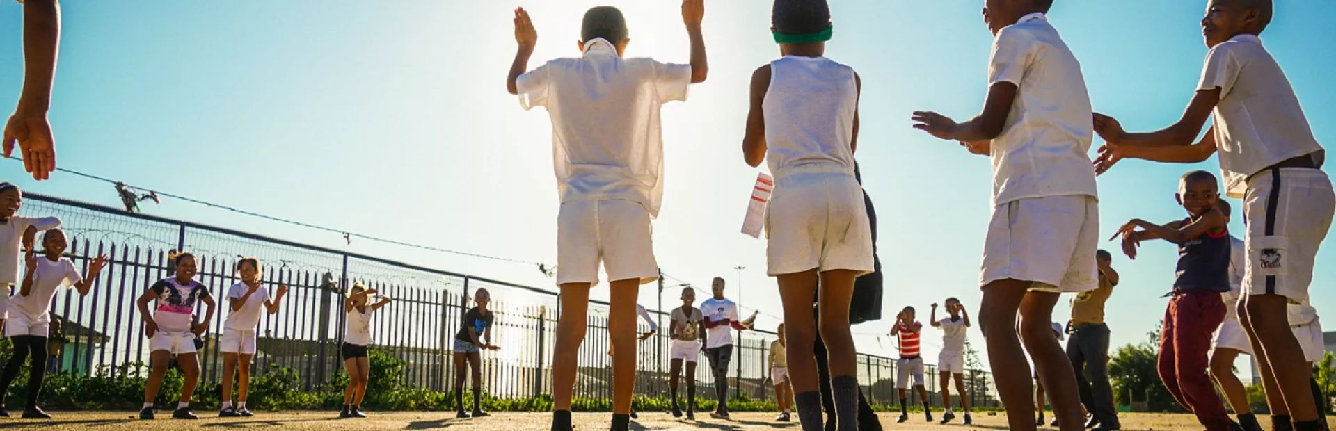 Image of Kids playing outside at school in South Africa addressing heart health in schools