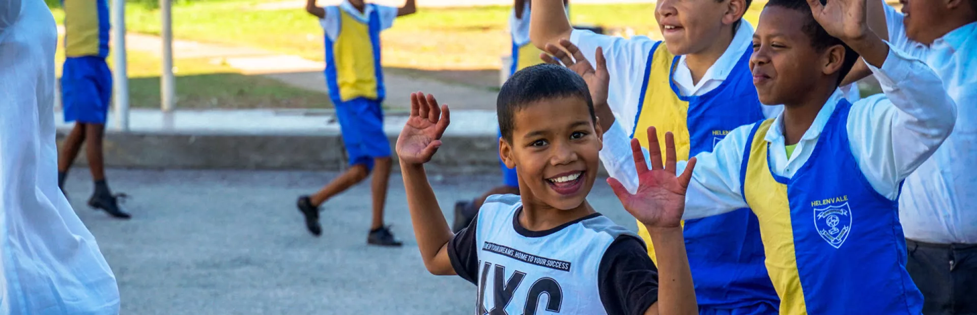 KaziBantu program: children in South Africa learning about cardio health and doing physical exercises outside of the school