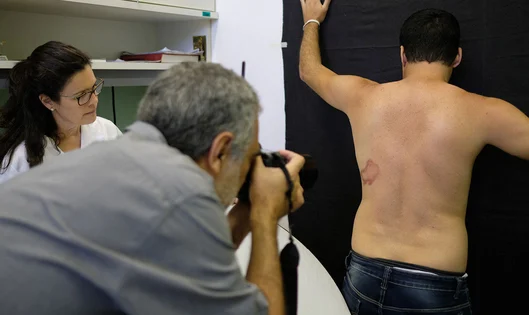 HCP taking pictures of a patient's condition