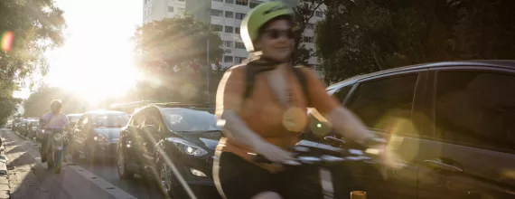 Woman cycling in the streets of Sao Paulo