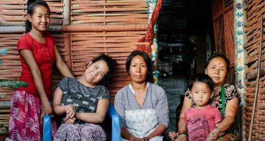 Family in front of their house participating in Leprosy Post-Exposure Prophylaxis (LPEP) Program in Nepal