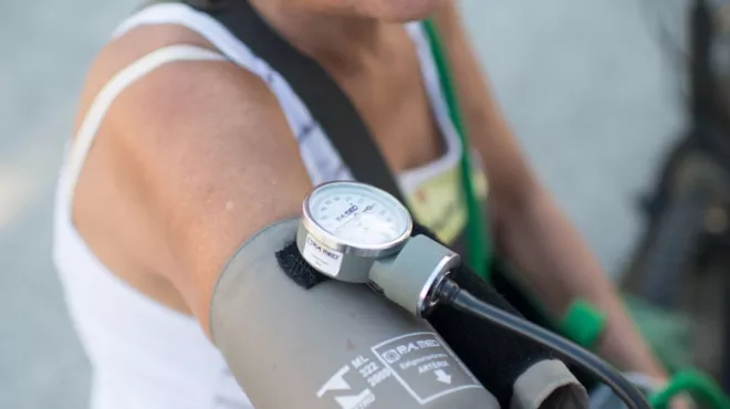 Man in Brazil getting blood pressure measured