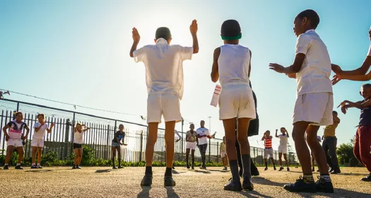 Kids playing outside at school in South Africa addressing heart health in schools